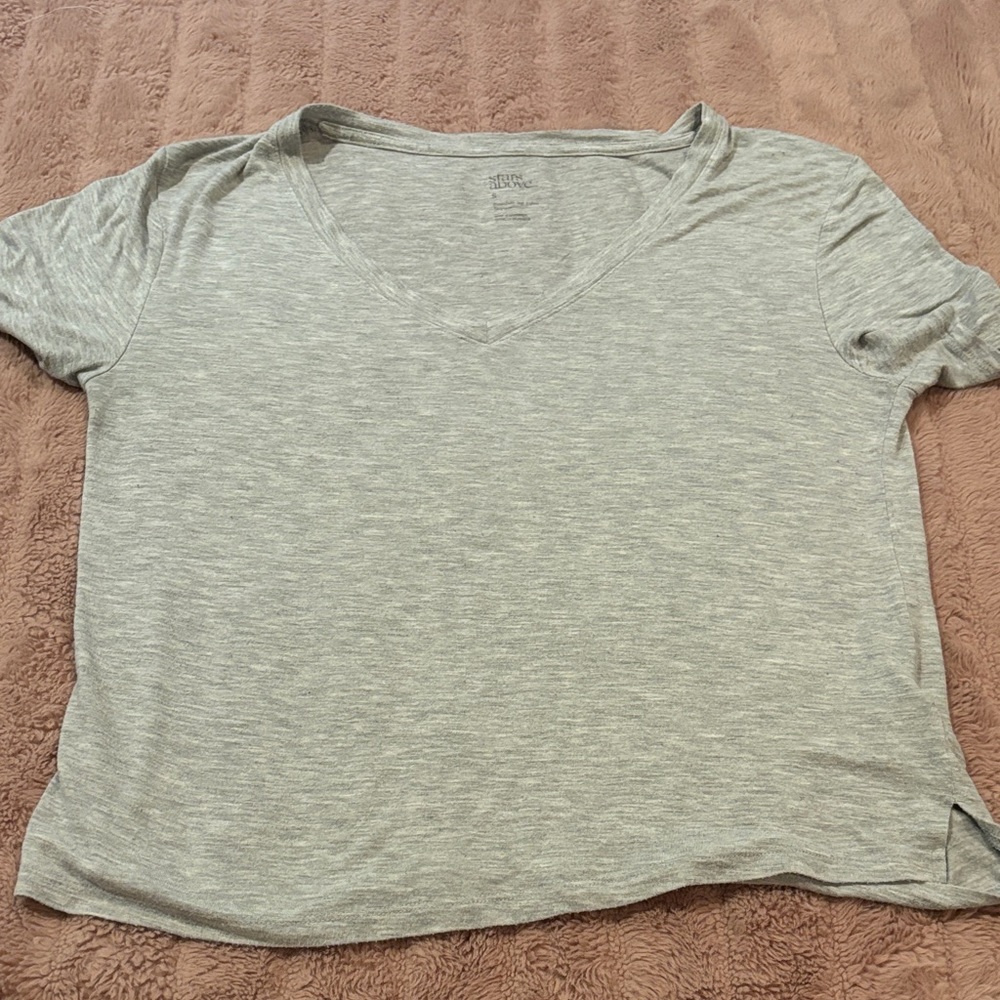 Stars above gray oversized v neck (size S)